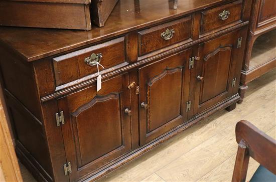 An 18th century design oak low dresser W.142cm